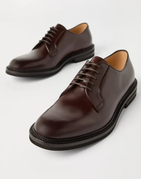 Aged calfskin Derbys