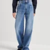 Authentic denim loose trousers with shiny tab