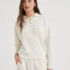 Cashmere cable knit polo-style sweater with monili