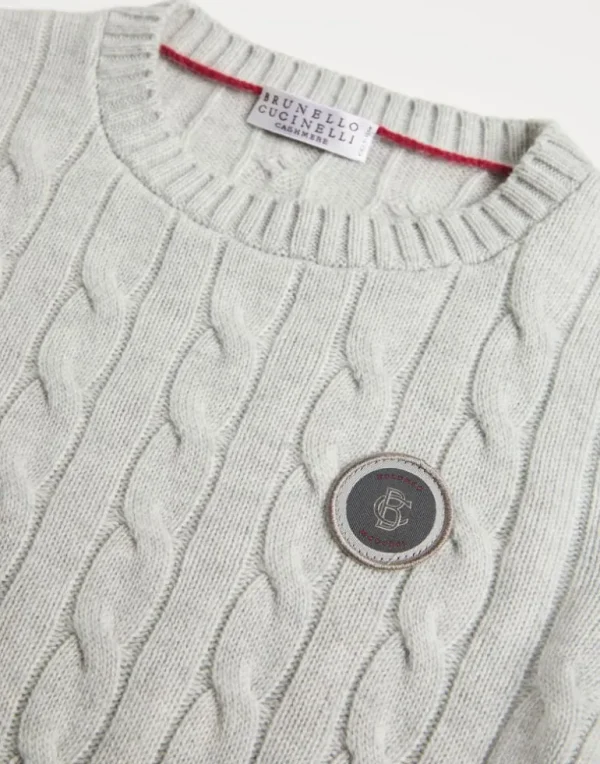 Cashmere cable knit sweater with patch