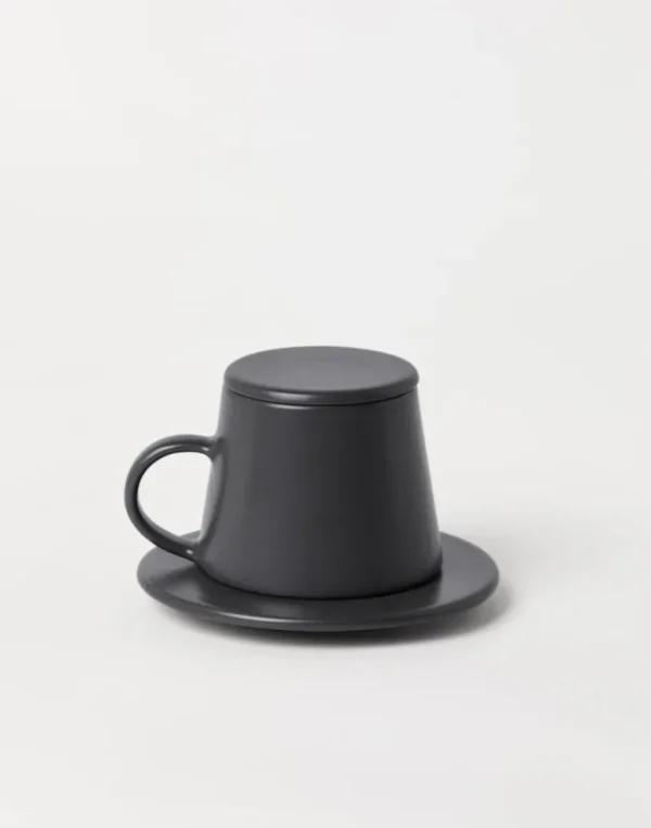 Ceramic cup with saucer and lid