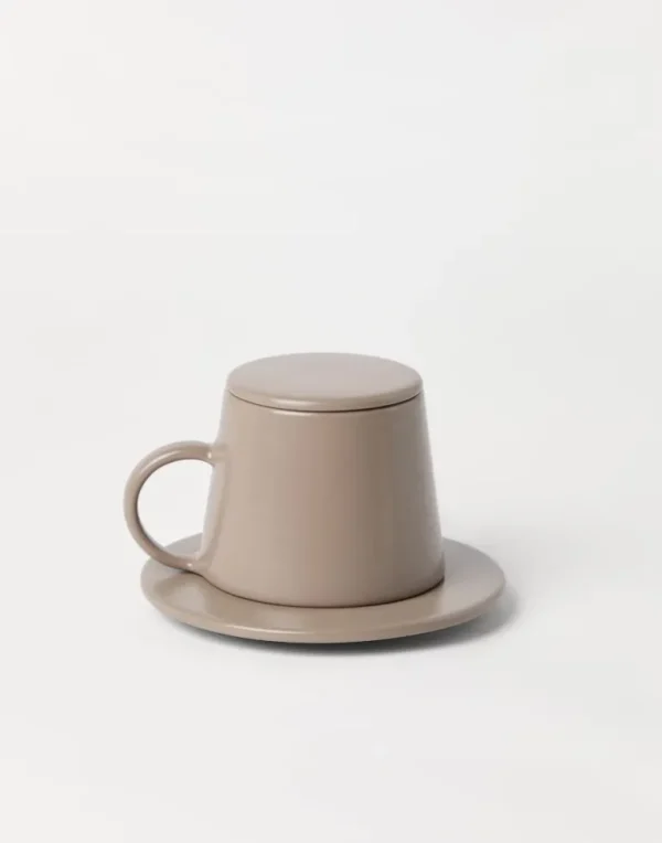 Ceramic cup with saucer and lid