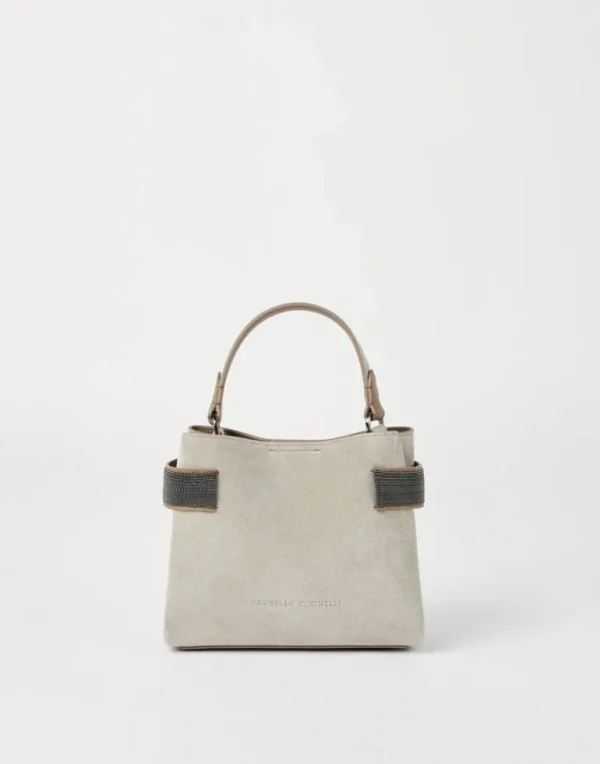 Essence small top-handle bag in suede with precious bands