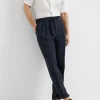 Garment-dyed leisure fit trousers in linen gabardine with drawstring and double pleats