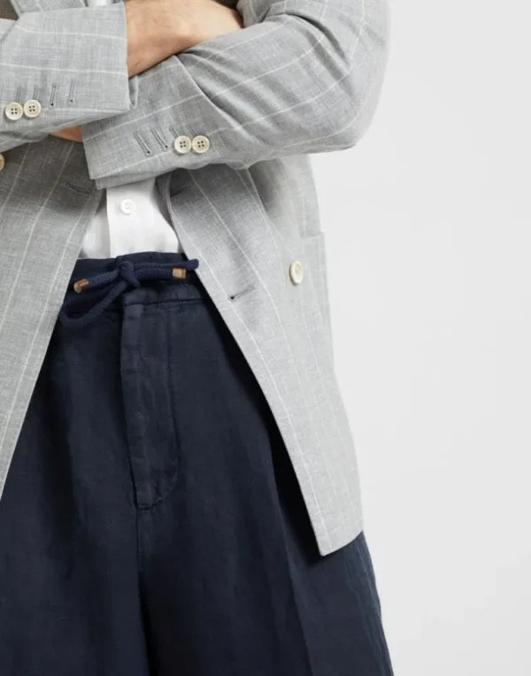 Garment-dyed leisure fit trousers in linen gabardine with drawstring and double pleats