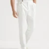 Garment-dyed tailor fit trousers in twisted cotton gabardine with double pleats and waist tabs