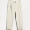 Garment-dyed trousers in twisted cotton gabardine with drawstring and double pleats