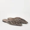 Glistening abstract embroidery flats in suede