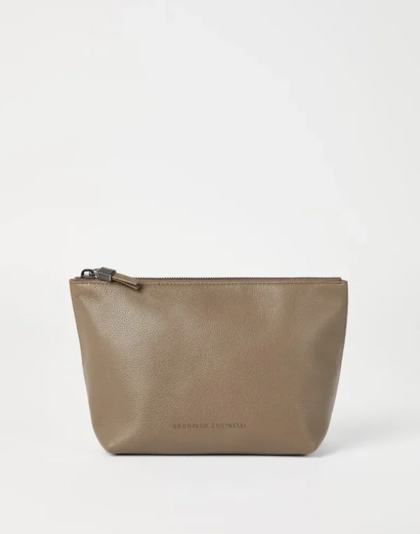 Grained leather pouch with shiny zipper pull