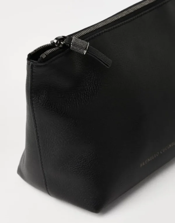 Grained leather pouch with shiny zipper pull