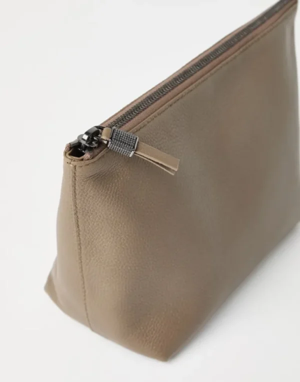 Grained leather pouch with shiny zipper pull