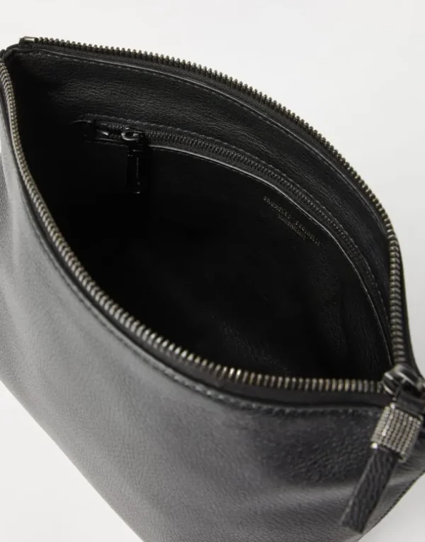 Grained leather pouch with shiny zipper pull