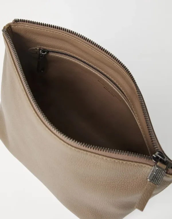 Grained leather pouch with shiny zipper pull