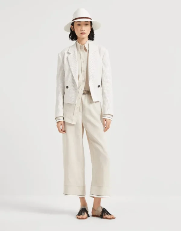 Linen baggy cropped trousers with shiny cuffs