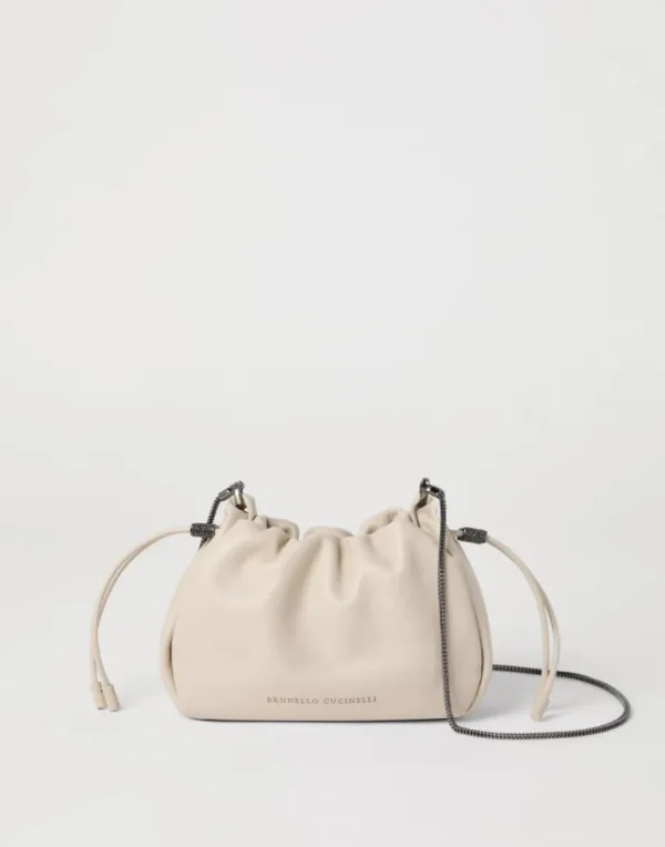 Mellow mini bucket bag in soft leather with precious chain