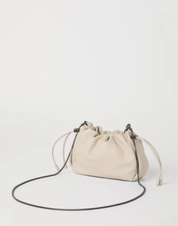 Mellow mini bucket bag in soft leather with precious chain