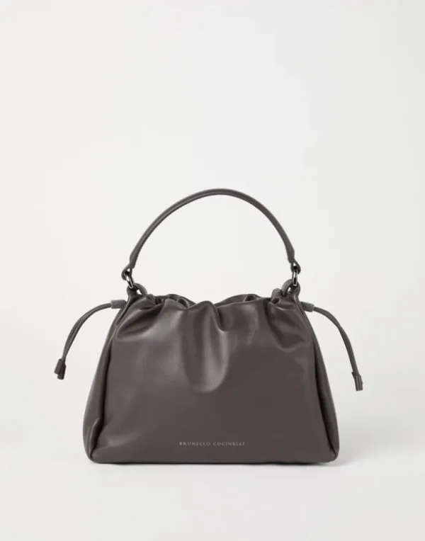 Mellow small bucket bag in soft leather with monili