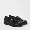 Minimal calfskin penny loafers with shiny tassels