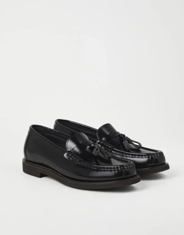 Minimal calfskin penny loafers with shiny tassels