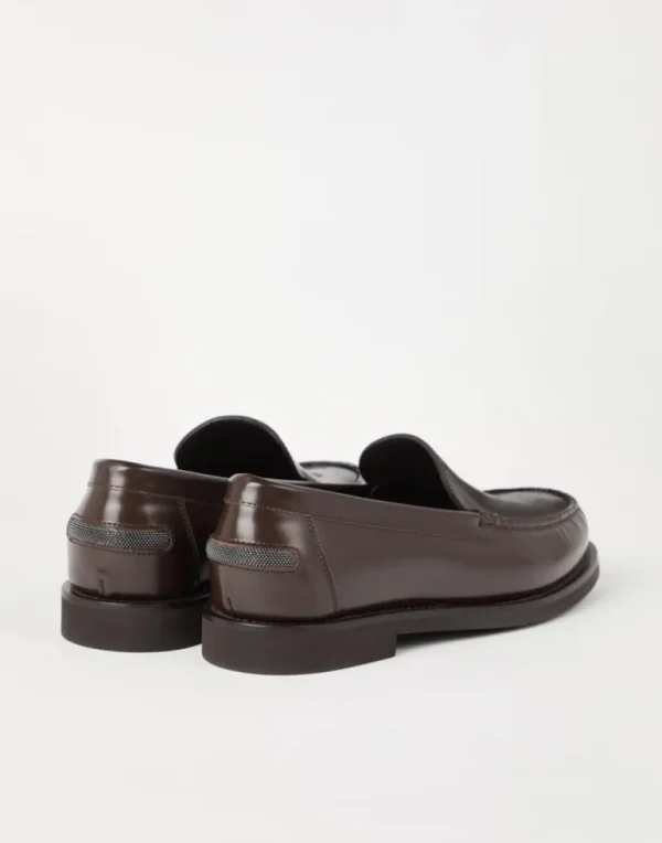 Minimal calfskin penny loafers with shiny detail