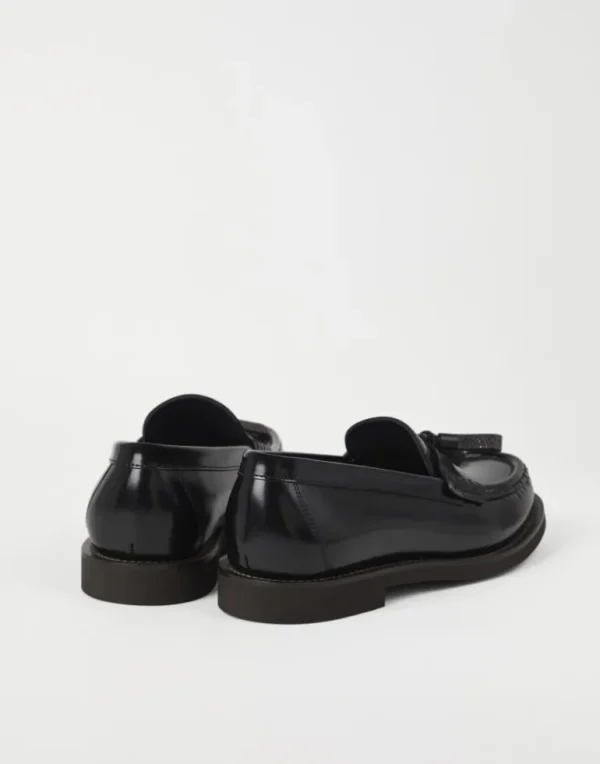 Minimal calfskin penny loafers with shiny tassels