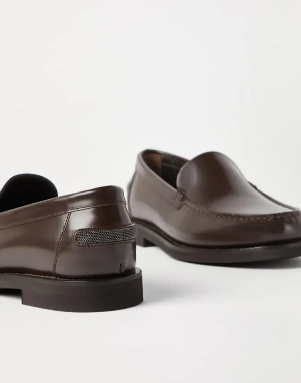 Minimal calfskin penny loafers with shiny detail