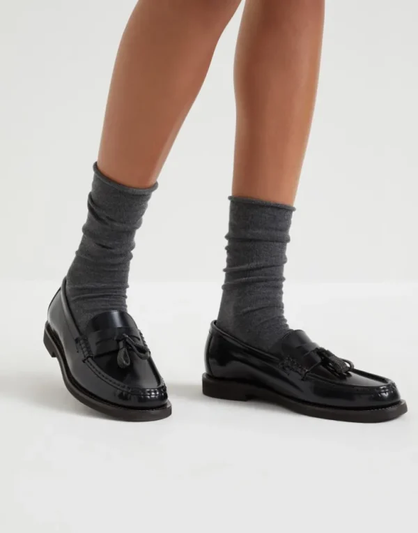 Minimal calfskin penny loafers with shiny tassels