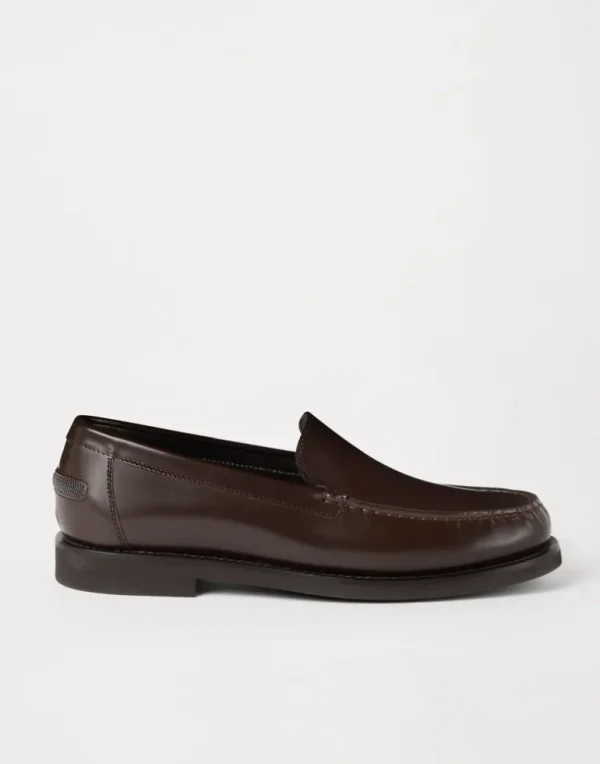 Minimal calfskin penny loafers with shiny detail