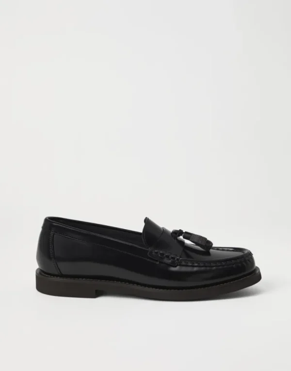 Minimal calfskin penny loafers with shiny tassels