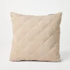 Quilted suede cushion with monili