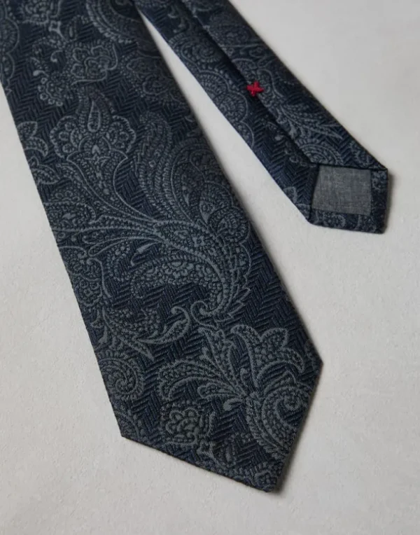 Silk and virgin wool tie with paisley design