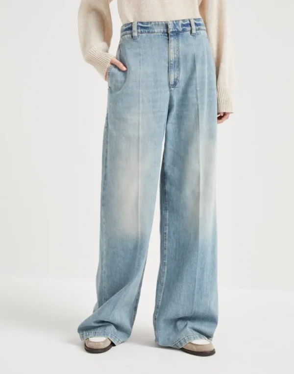 Soft denim low slung trousers with adjustable waist and monili