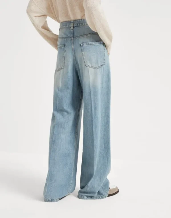 Soft denim low slung trousers with adjustable waist and monili