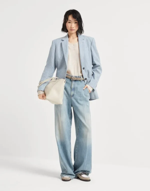 Soft denim low slung trousers with adjustable waist and monili