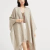 Striped sparkling linen poncho with fringe