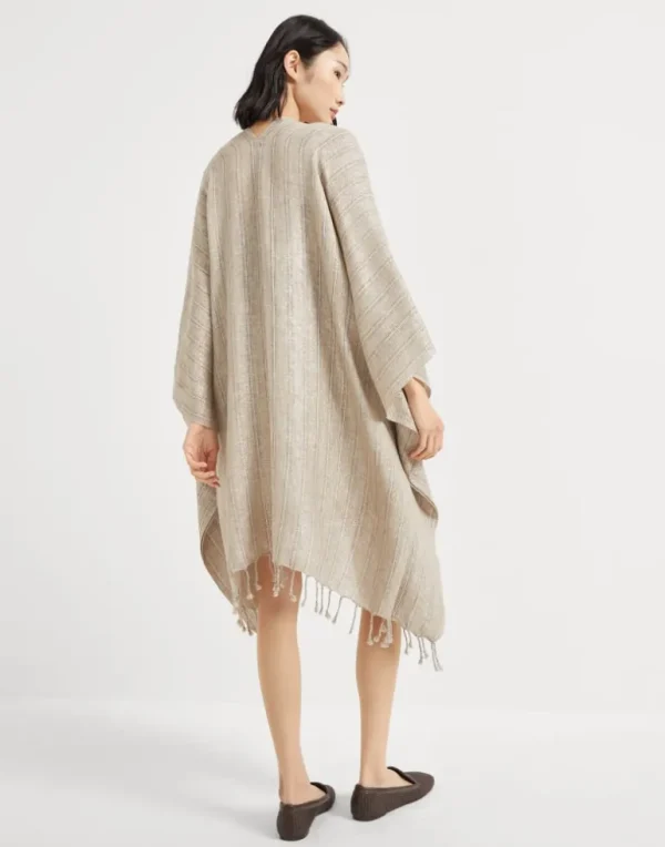 Striped sparkling linen poncho with fringe