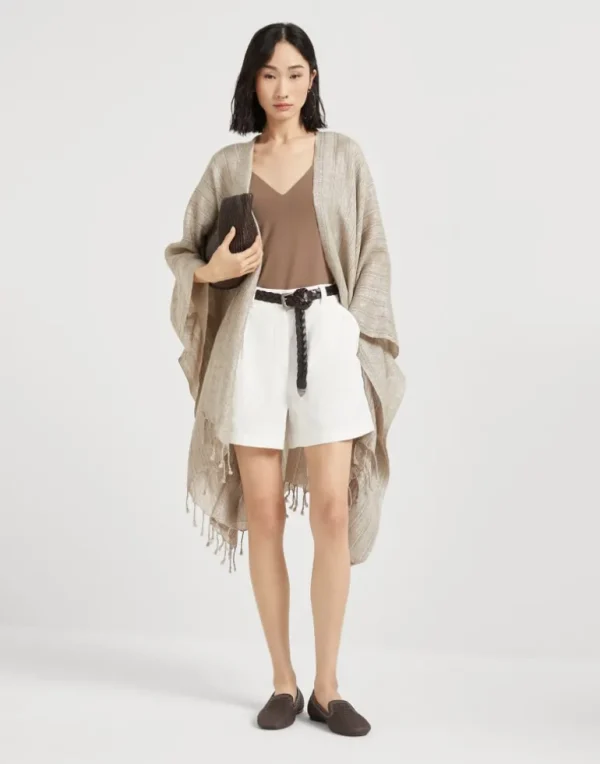 Striped sparkling linen poncho with fringe