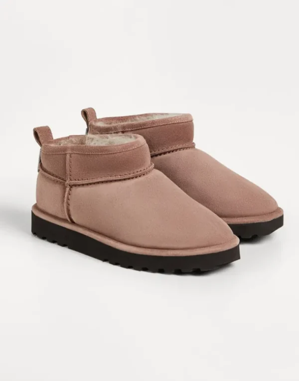 Suede boots with shearling lining and monili