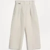 Viscose and linen fluid twill pleated A-line trousers with monili