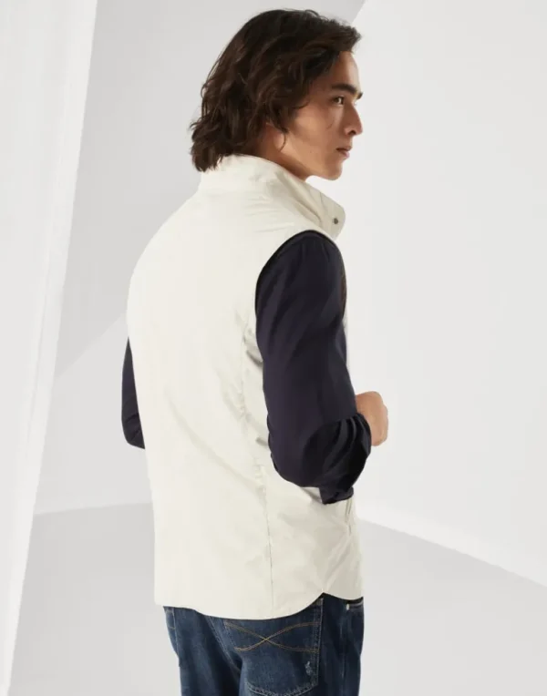 Water-resistant microfiber vest with Thermore® padding and detachable hood