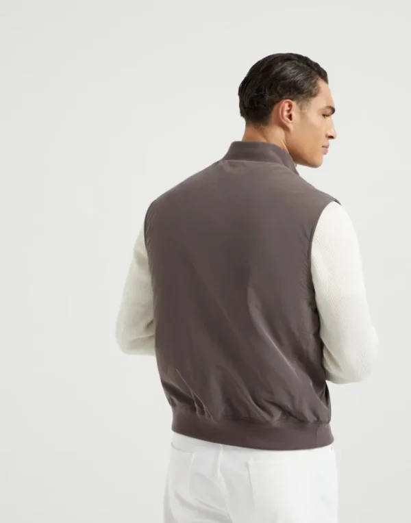 Water-resistant microfiber vest with Thermore® padding and knit inserts