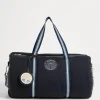 Water-resistant techno cotton gabardine bag with surf print