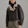 Waxed shearling biker jacket with shiny details